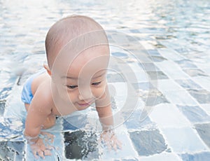 Little boy in the swimming pool