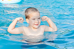 Little boy at swimming pool