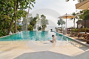 Little boy in the swimming pool