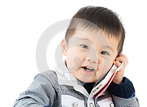 Little boy talk to phone