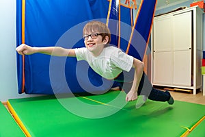 Little boy in tape sensory integration