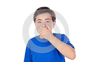 Little boy with ten years old covering his mouth