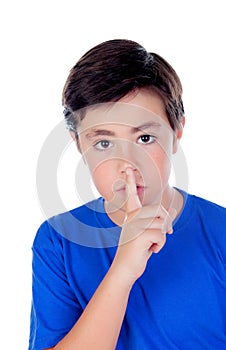 Little boy with ten years old indicating silence
