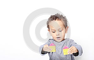 Little boy with toy building blocks stock photo