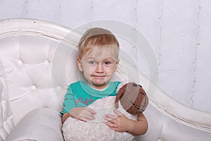 Little boy with toy sheep