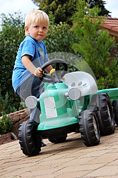 Little boy with tractor