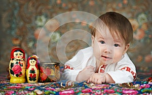 Little boy in a traditional russian shirt with embroidery