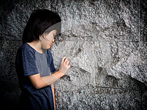 Little boy unhappy sad and tress alone photo