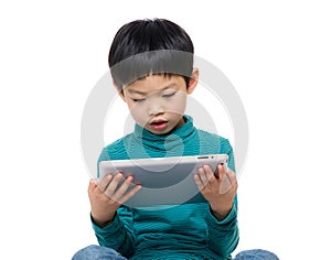 Little boy using tablet computer