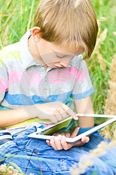 Little boy using tablet