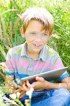Little boy using tablet