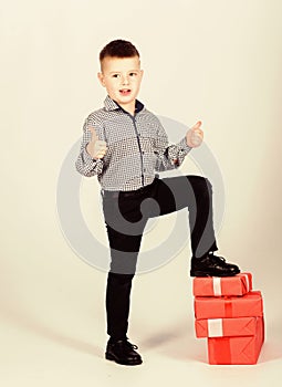 Little boy with valentines day gift. Birthday party. shop assistant. Happy childhood. Shopping. Boxing day. New year