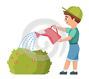 Little boy watering garden plant