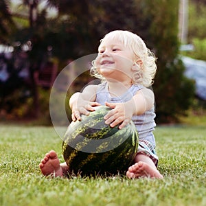 Little boy and watermelon