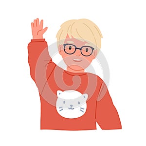 Little boy waving, smiling and saying hi or bye. Scandinavian child in eyewear gesturing with hand. Portrait of happy