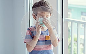 A boy wearing face mask to protect virus