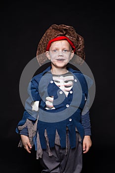 Little boy wearing pirate costume. Halloween