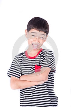 Little boy wih funny face smiling on white background photo