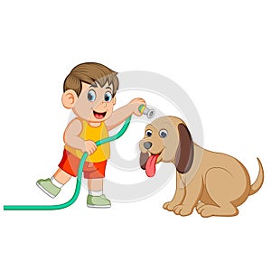 A little boy with the yellow cloth will clean his big brown dog with the pipe