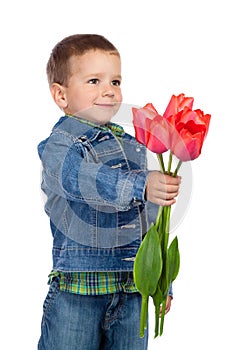 Little boyl with red tulips