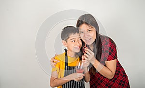 Little boys blend water melone juice by using blender home