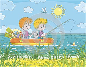 Little boys in an inflatable boat fishing in a lake