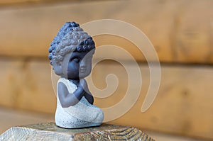 Little Buddha statue image used as amulets of Buddhism religion. Meditation concept with empty space for text