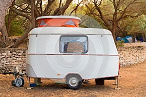 Little caravan with orange open roof