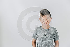 Little caucasian boy in a studio setting