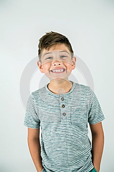 Little caucasian boy in a studio setting