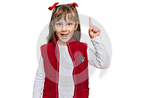 Little caucasian girl kid wearing casual clothes pointing finger up with successful idea