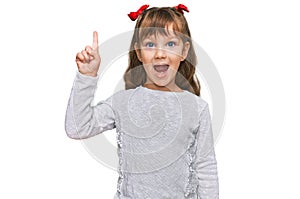 Little caucasian girl kid wearing casual clothes pointing finger up with successful idea