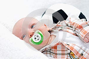 Little chap with a pacifier photo