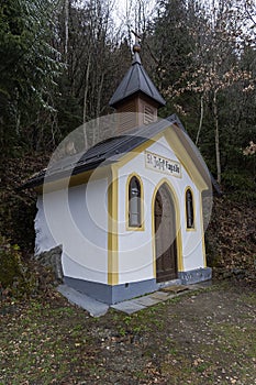 Little chapel in the forest on the mountainside