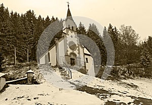 Little chapel in the forest on the mountainside