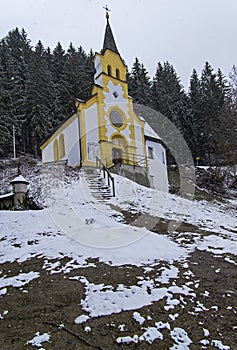 Little chapel in the forest on the mountainside