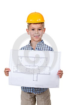 Little cheerful builder in yellow hardhat with paper plan in hands, isolated on white