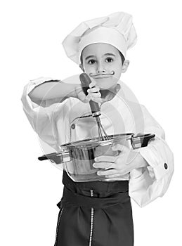 Little chef with kitchen utensil