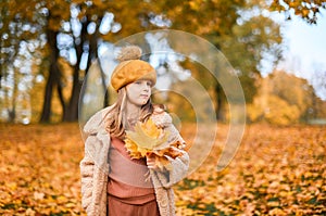 Little Child Baby Girl Caucasian Walking in Park with Leaf Autumn Golden Fall