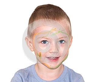 Little child boy painted on face paint