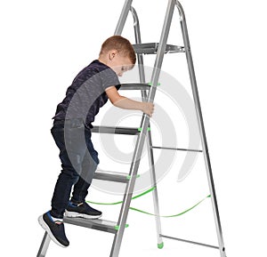 Little child climbing up ladder on background. Danger at home