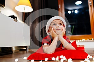 Little child dreaming about Christmas.