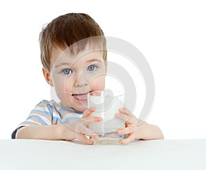 Little child drinking yogurt or kefir over white