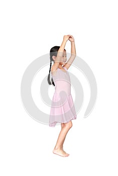 Little child girl dreams of becoming a ballerina. Beautiful little Asian children in pink tutu skirt isolated on white background