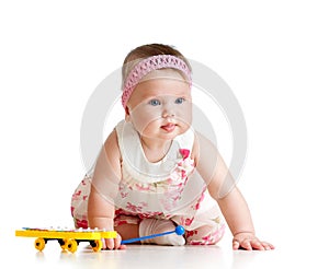 Little child girl playing musical toy