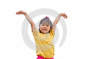 Little child girl smile in a gesture to fly on white background. Active leisure and outdoor sport for children