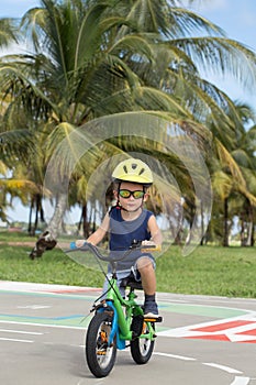 Little child  with his bike