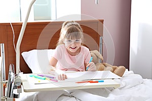 Little child with intravenous drip drawing