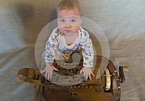 Little child with musical instrument hurdy-gurdy