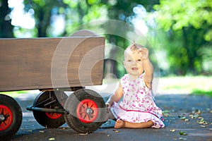 Little child and old wagon trolley